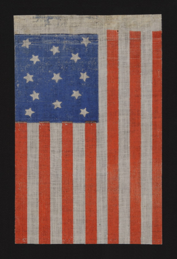 ANTIQUE AMERICAN FLAG WITH 13 STARS IN A MEDALLION CONFIGURATION